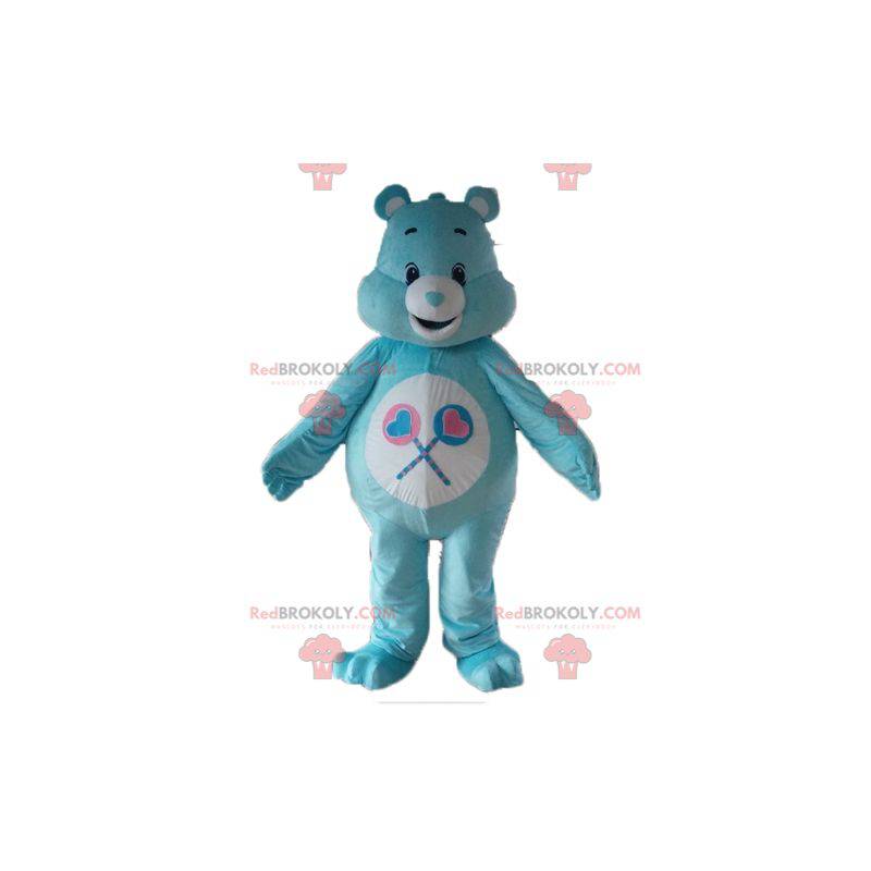 Mascota de oso de cuidado azul y blanco con piruletas -