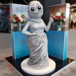 Silver Wedding Cake mascot costume character dressed with a Bikini and Scarves