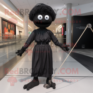 Black Tightrope Walker mascot costume character dressed with a Wrap Dress and Tie pins