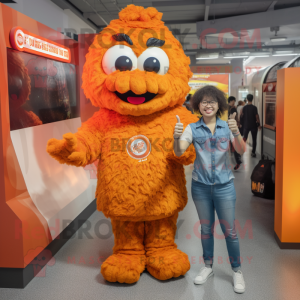 Orange Fried Chicken mascot costume character dressed with a Bootcut Jeans and Rings