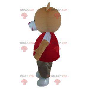 Orange Teddybär Maskottchen mit einem bunten Outfit -