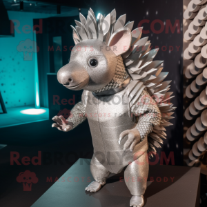 Silver Armadillo mascot costume character dressed with a Jeggings and Hairpins