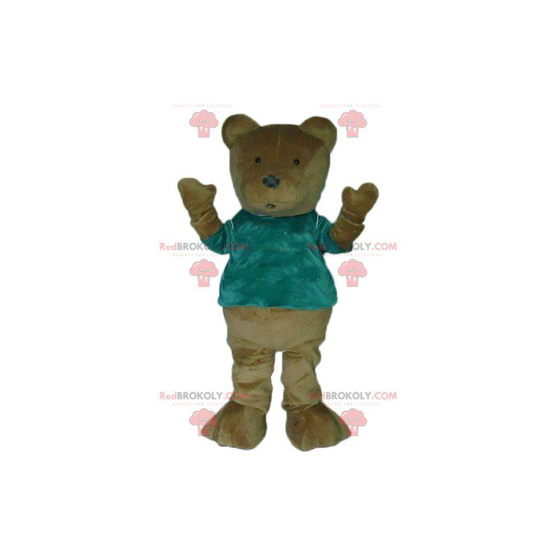 Braunes Teddybärmaskottchen mit einem grünen T-Shirt -