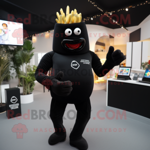 Black French Fries mascot costume character dressed with a Jumpsuit and Smartwatches