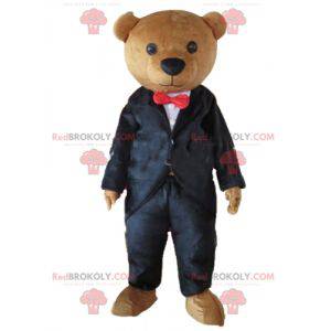 Brown teddy bear mascot dressed in a black costume -