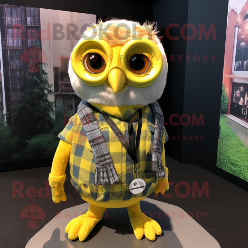 Lemon Yellow Owl mascot costume character dressed with a Flannel Shirt and Necklaces Lemon Yellow Owl mascot costume character dressed with a Flannel Shirt and Necklaces