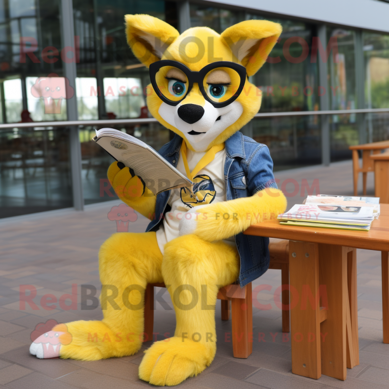 Yellow Dingo mascot costume character dressed with a Boyfriend Jeans and Reading glasses