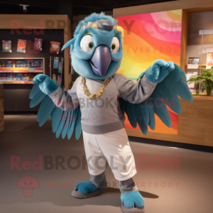 Silver Macaw mascot costume character dressed with a Jeggings and Headbands