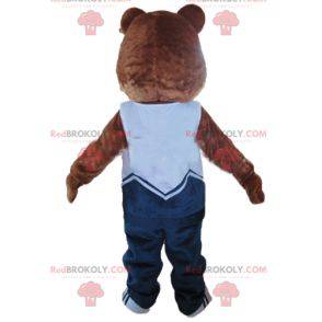 Mascotte bruine en beige teddybeer in blauwe outfit -