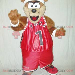 Mascota del oso de peluche marrón en ropa deportiva roja -