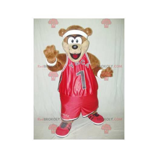 Mascote urso de pelúcia marrom em roupas esportivas vermelhas -
