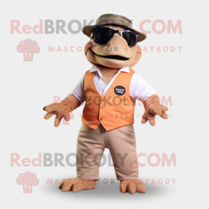 Peach Komodo Dragon mascot costume character dressed with a Waistcoat and Eyeglasses