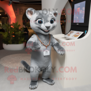 Silver Jaguarundi mascot costume character dressed with a Polo Tee and Keychains