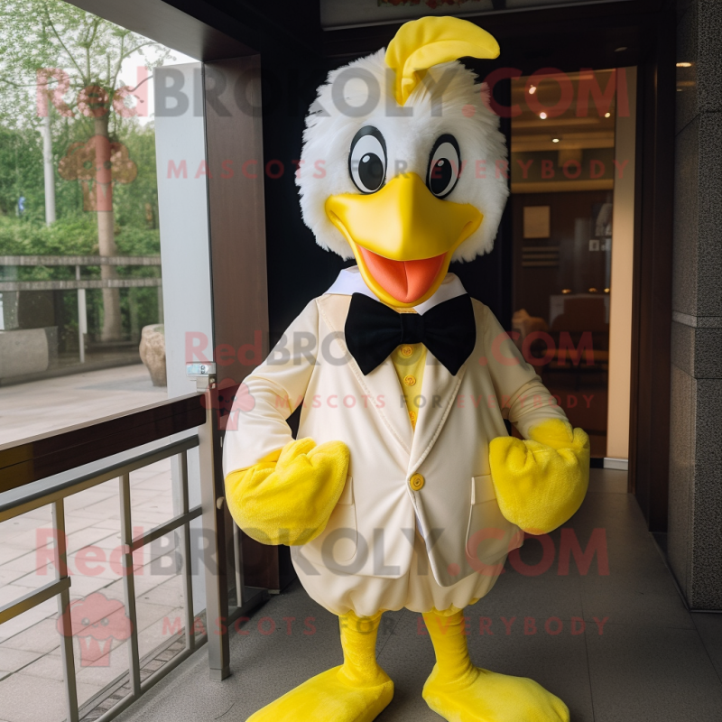 Lemon Yellow Roosters mascot costume character dressed with a Tuxedo and Bow ties Lemon Yellow Roosters mascot costume character dressed with a Tuxedo and Bow ties
