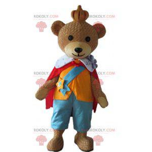 Mascote urso pardo vestido com uma roupa colorida de rei