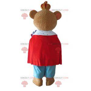 Mascota oso pardo vestida con un colorido traje de rey -