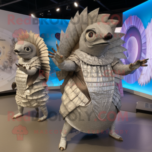 Silver Armadillo mascot costume character dressed with a Wrap Dress and Rings