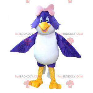 Mascot gran pájaro azul y blanco con un lazo rosa -