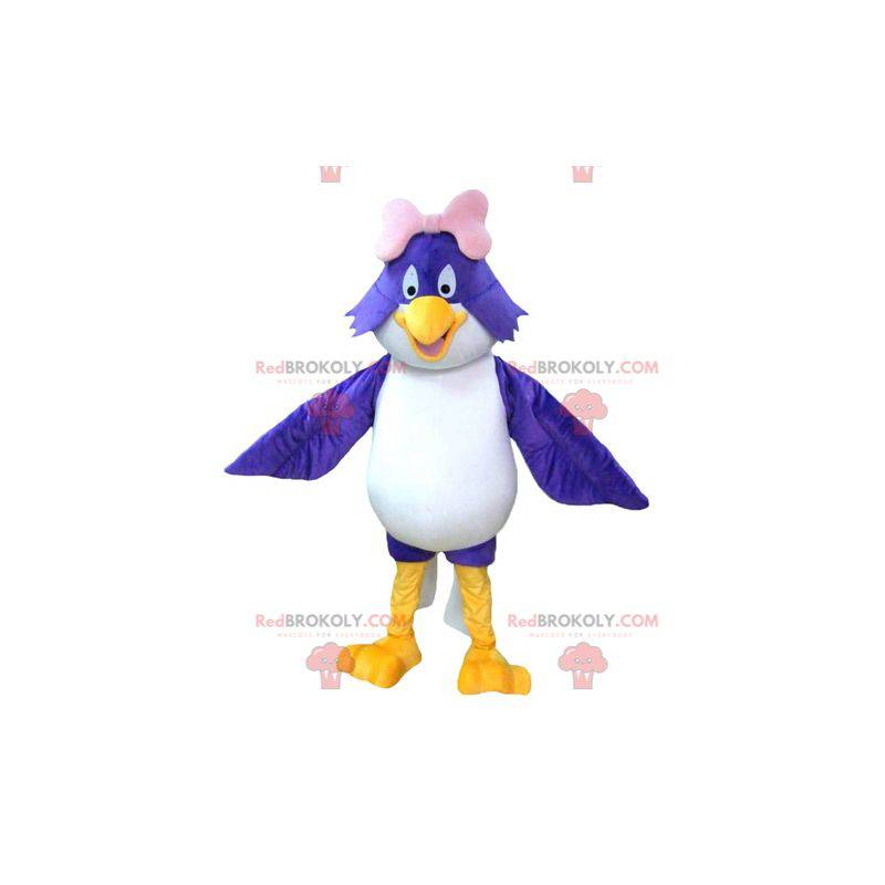 Mascot gran pájaro azul y blanco con un lazo rosa -