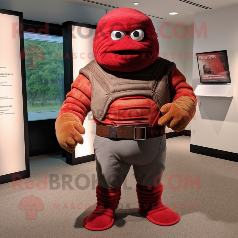 Red Trilobite mascot costume character dressed with a Henley Shirt and Belts