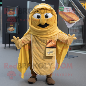 Gold Falafel mascot costume character dressed with a Sweatshirt and Scarf clips