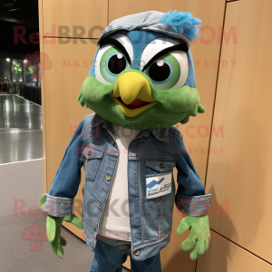 Green Blue Jay mascot costume character dressed with a Denim Shirt and Lapel pins