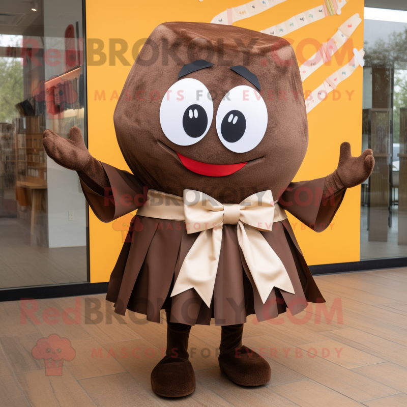 Brown Enchiladas mascot costume character dressed with a Skirt and Bow ties Brown Enchiladas mascot costume character dressed with a Skirt and Bow ties