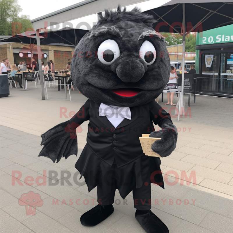 Black Fish And Chips mascot costume character dressed with a Blouse and Tie pins