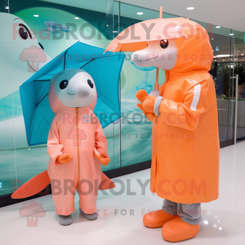 Peach Dolphin mascot costume character dressed with a Raincoat and Watches