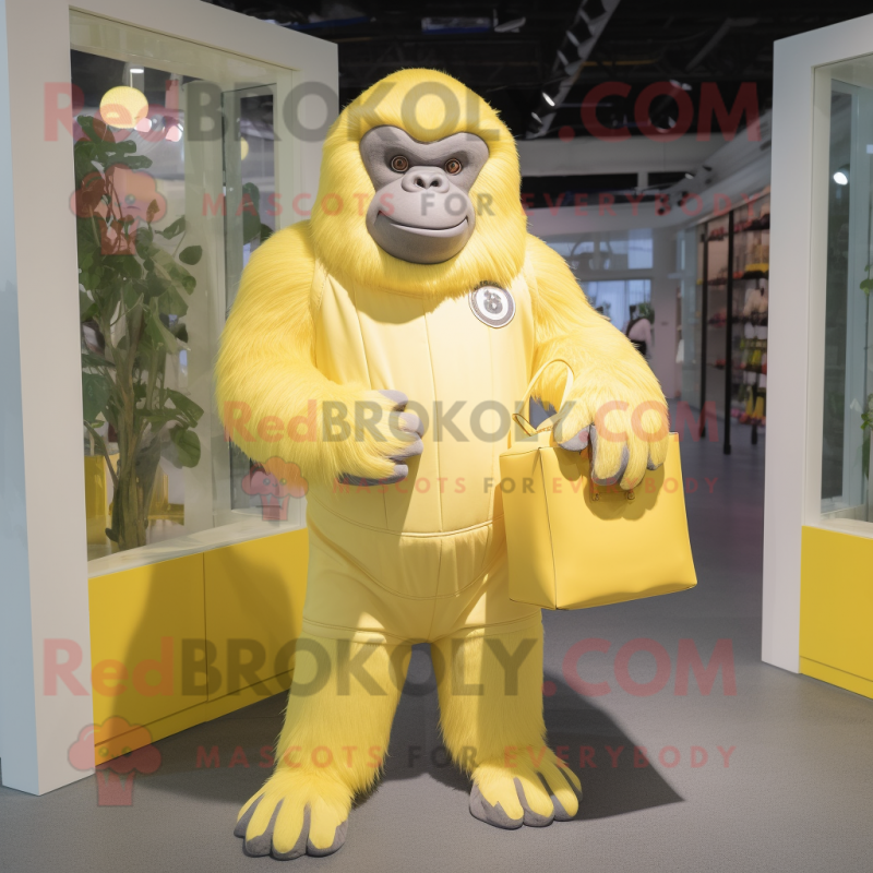 Lemon Yellow Gorilla mascot costume character dressed with a Romper and Tote bags Lemon Yellow Gorilla mascot costume character dressed with a Romper and Tote bags