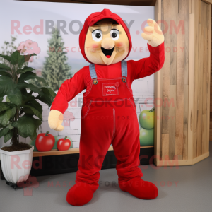 Red Apple mascot costume character dressed with a Dungarees and Gloves