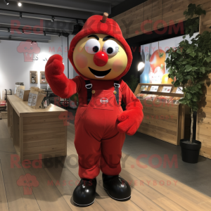 Red Apple mascot costume character dressed with a Dungarees and Gloves