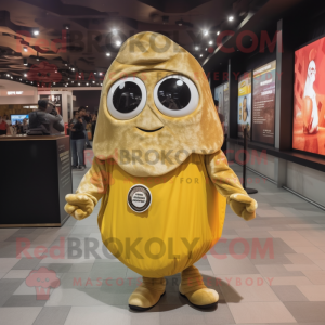 Gold Oyster mascot costume character dressed with a Overalls and Shawl pins
