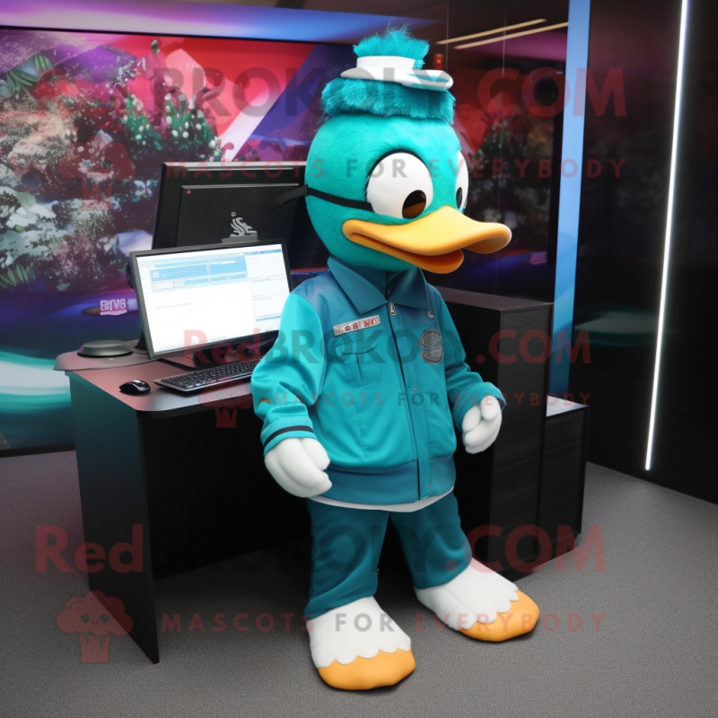 Teal Computer mascot costume character dressed with a Jacket and Watches Teal Computer mascot costume character dressed with a Jacket and Watches