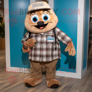 Tan Tuna mascot costume character dressed with a Flannel Shirt and Foot pads