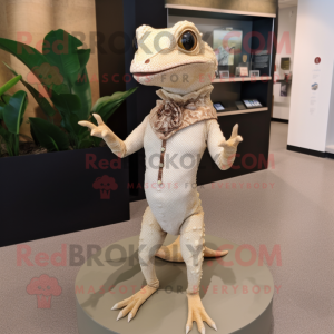 Beige Geckos mascot costume character dressed with a Sheath Dress and Anklets