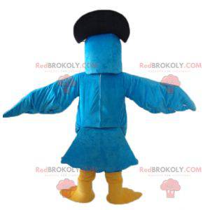 Mascote papagaio azul e amarelo com um chapéu preto -