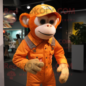 Orange Monkey mascot costume character dressed with a Overalls and Headbands