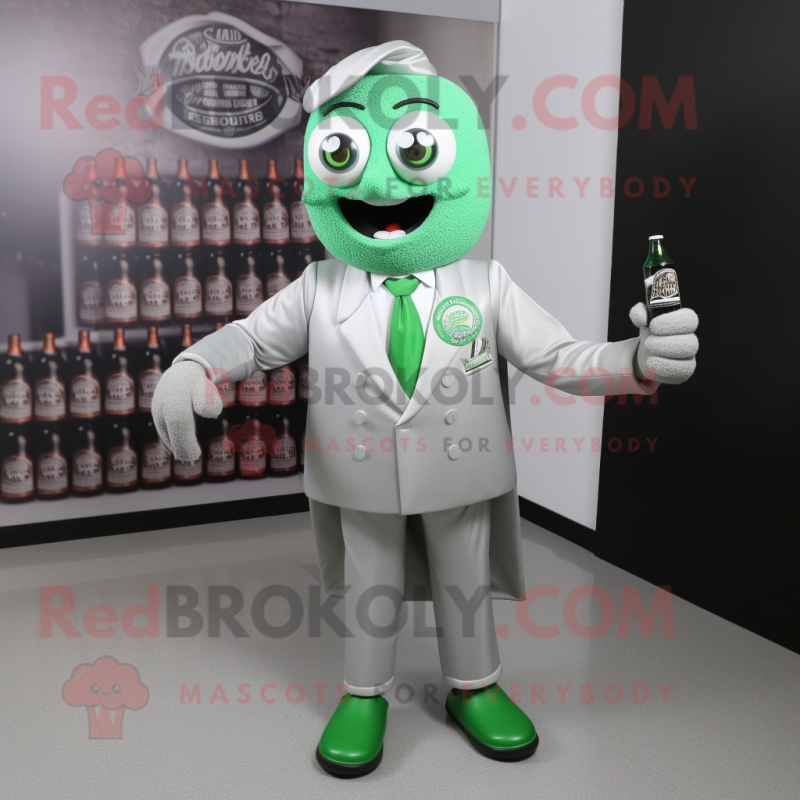 Silver Green Beer mascot costume character dressed with a Suit Jacket and Shoe laces Silver Green Beer mascot costume character dressed with a Suit Jacket and Shoe laces