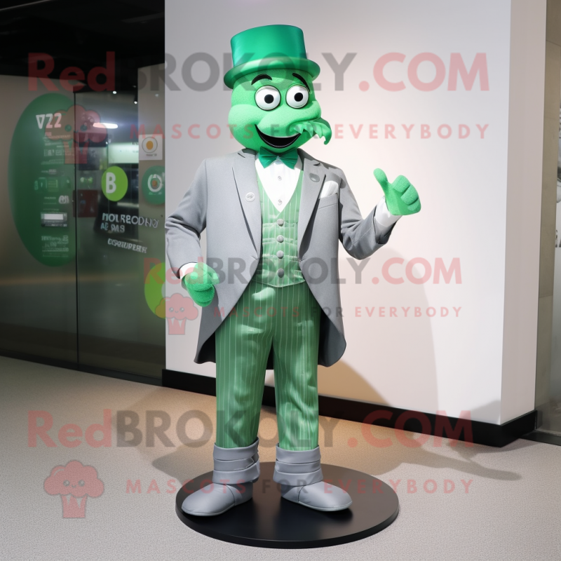 Silver Green Beer mascot costume character dressed with a Suit Jacket and Shoe laces Silver Green Beer mascot costume character dressed with a Suit Jacket and Shoe laces