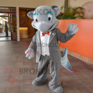 Gray Dolphin mascot costume character dressed with a Blazer and Tie pins