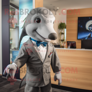 Gray Dolphin mascot costume character dressed with a Blazer and Tie pins