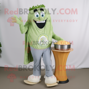 Silver Pesto Pasta mascot costume character dressed with a Jeans and Foot pads