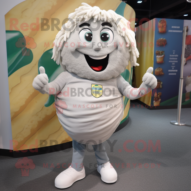 Silver Pesto Pasta mascot costume character dressed with a Jeans and Foot pads