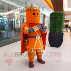 Orange Medieval Knight mascot costume character dressed with a Suit Pants and Bracelet watches