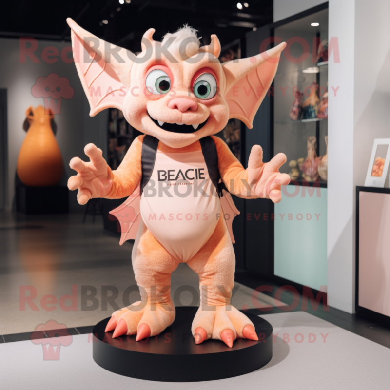 Peach Gargoyle mascot costume character dressed with a Romper and Foot pads Peach Gargoyle mascot costume character dressed with a Romper and Foot pads