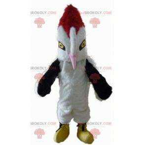 Mascot hermoso pájaro blanco negro y rojo con un pico grande -