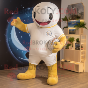 Gold Beluga Whale mascot costume character dressed with a Rugby Shirt and Hairpins