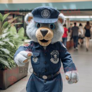 Navy Lion mascot costume character dressed with a Denim Shirt and Caps