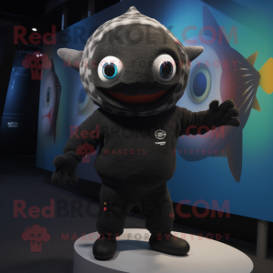 Black Tuna mascot costume character dressed with a Sweater and Beanies